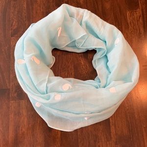 Light blue infinity scarf with white whale pattern